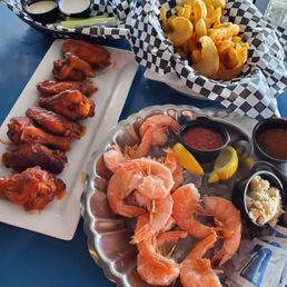 Lunch, wings, peel and eat shrimp and potato wedges Lunch, wings, peel and eat shrimp and potato wedges