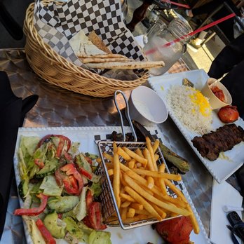 The Atmosphere - Chicken breast kebab with salad and fries, barg with rice and hummus, and of course the best hookah flavor Joey's mix! - Mediterranean Near Me - Glendale, California The Atmosphere - Chicken breast kebab with salad and fries, barg with rice and hummus, and of course the best hookah flavor Joey's mix! - Mediterranean Near Me - Glendale, California