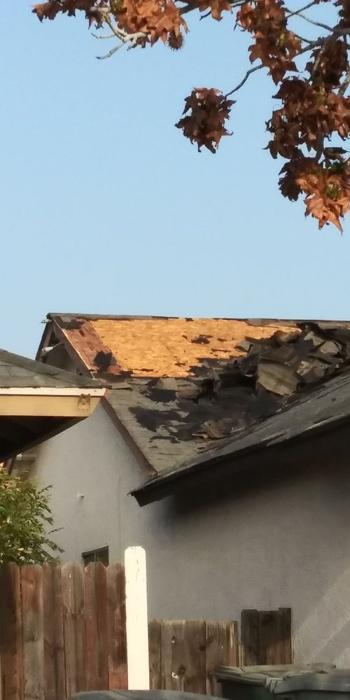 Slide of Dan's Roofing