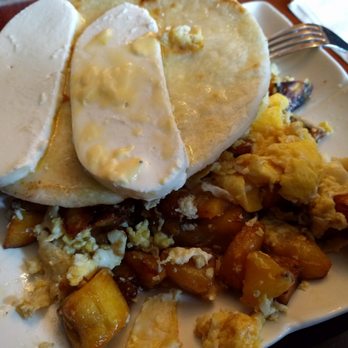 Tertulias - a plate of food on a table - Colombian Near Me - Boston, Massachusetts
