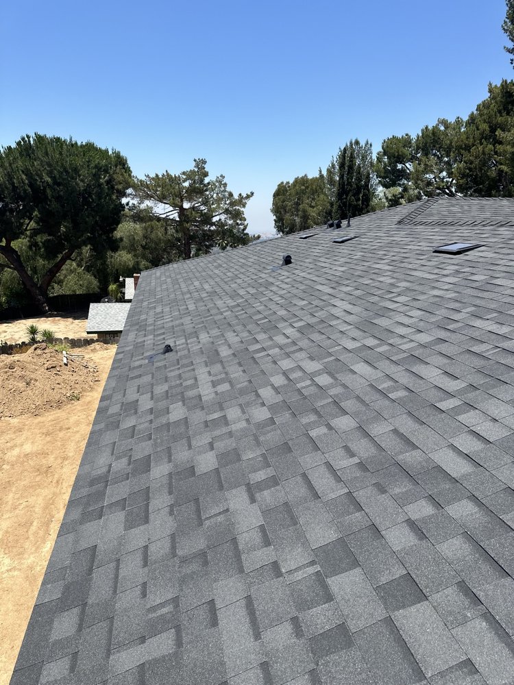 Slide of Meza's Roofing