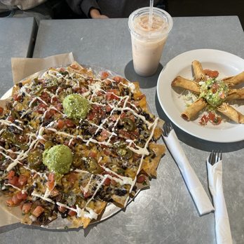 Sharky's Woodfired Mexican Grill - Nachos Grande and Chicken Taquitos - Mexican Near Me - Studio City, California Sharky's Woodfired Mexican Grill - Nachos Grande and Chicken Taquitos - Mexican Near Me - Studio City, California