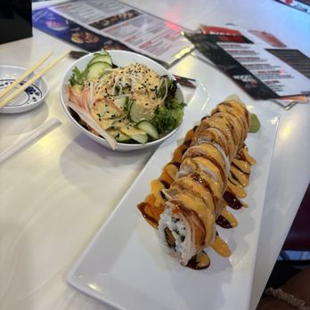 Rock N Roll Sushi - Groupie roll w/ cucumber salad - Sushi Bars Near Me - Nashville, Tennessee Rock N Roll Sushi - Groupie roll w/ cucumber salad - Sushi Bars Near Me - Nashville, Tennessee