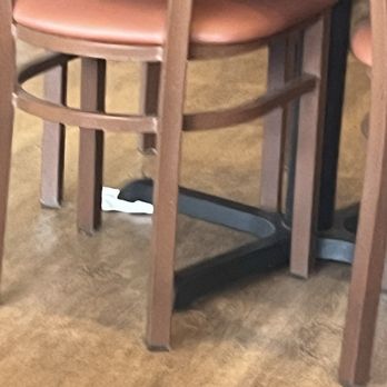 IHOP - Table balanced by dirty napkins - American Near Me - Edgewood, Maryland