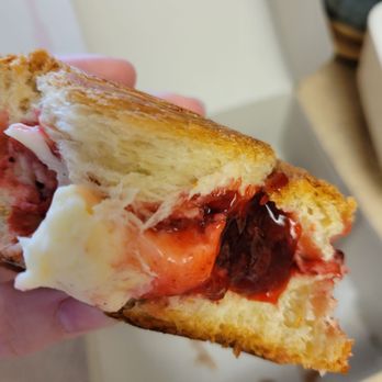 Friendly Donuts - Inside of the strawberry cream filled croissant roll deliciousness. Highly recommended! - Donuts Near Me - Orange, California