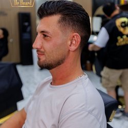 Dr Beard Barbershop - Fresh men's scissor haircut with a clean taper and natural finish at Dr. Beard Barbershop Anaheim