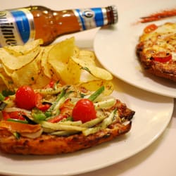 Milonga's - Milapizza y cerveza Quilmes.