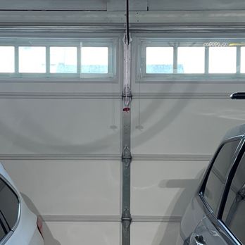 Impact Garage Doors - Broken Spring on Garage Door - Garage Door Services Near Me - Nashville, Tennessee Impact Garage Doors - Broken Spring on Garage Door - Garage Door Services Near Me - Nashville, Tennessee