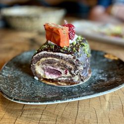 Chef's Table - Slice of exquisite chocolate strawberry cream cake