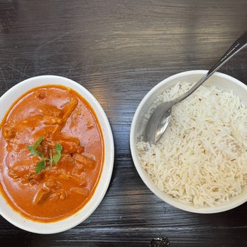 Nirvana Culinary Paradise - Butter Chicken with white rice.  It was delicious! - Indian Near Me - Cañon City, Colorado
