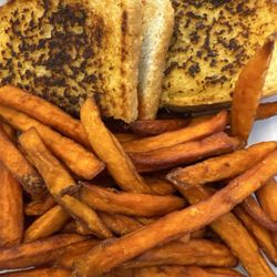Midway Grille - Grilled Meatloaf sandwich with sweet potato fries.