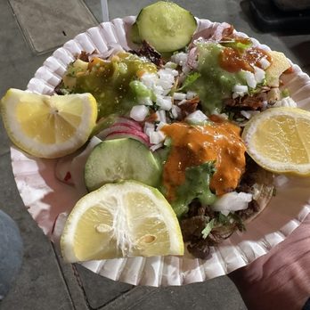 Tacos La Guera - 2 Al pastor and a carne asada tacos - smothered with fresh toppings and salsas - Food Trucks Near Me - Los Angeles, California