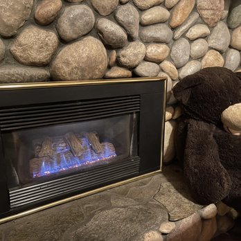 Fireside Lodge - Bear by gas fireplace. Fireplace keeps room warm and cosy! - Hotels Near Me - South Lake Tahoe, California Fireside Lodge - Bear by gas fireplace. Fireplace keeps room warm and cosy! - Hotels Near Me - South Lake Tahoe, California