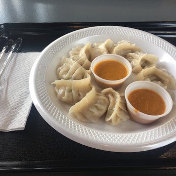 Momo King - a plate of dumplings with dipping sauce - Himalayan/Nepalese Near Me - Scranton, Pennsylvania Momo King - a plate of dumplings with dipping sauce - Himalayan/Nepalese Near Me - Scranton, Pennsylvania