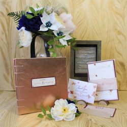 Papercraft Miracles - Handmade paper invitation suite with matching bridal bouquet and boutonniere.