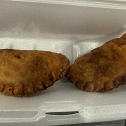 Taino's Caribbean Cuisine - Chicken Empanada (left), Guava & cream cheese Empanada (right)