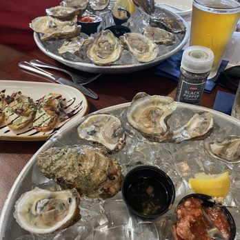 Shrimpers Grill & Raw Bar - Oysters football and beer in the breezeway!!! - Seafood Near Me - Stuart, Florida