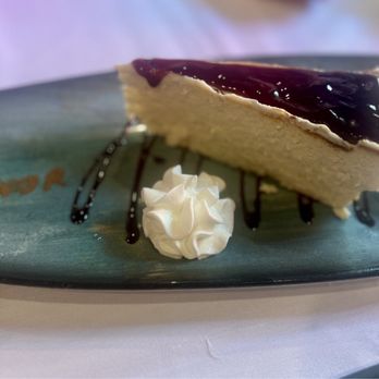 Savor Restaurant - Cheesecake with raspberry sauce - New American Near Me - Somerville, New Jersey