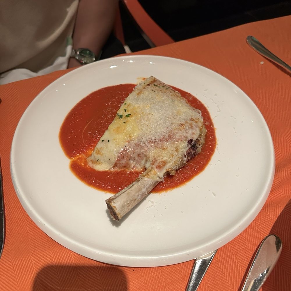 Sinatra - Half of Veal Parmigiana - Italian Near Me - Las Vegas, Nevada Sinatra - Half of Veal Parmigiana - Italian Near Me - Las Vegas, Nevada