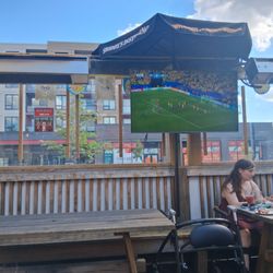 O'Byrne's Irish Pub - Watching Scotland vs Brazil on the patio