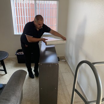 EasyPro Movers - Wrapping like a champ! - Movers Near Me - Oakland Park, Florida