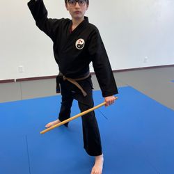 Fort Union Bobby Lawrence Karate - Kid Champs become Juniors with significant skills and capabilities. He's been training for 6 years as of this photo.