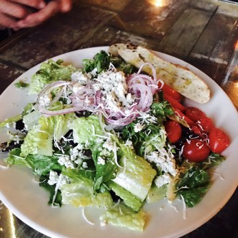 Cafe Reyes - The best salad! Crisp, fresh lettuce, pickled red onions and crumbled Point Reyes blue cheese tossed in a creamy Caesar-ish dressing. - Pizza Near Me - Point Reyes Station, California