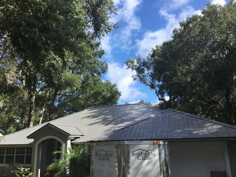 Slide of Reiter Roofing