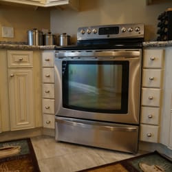 John Sun Kitchen & Bath - Spice drawers on either side of the stove