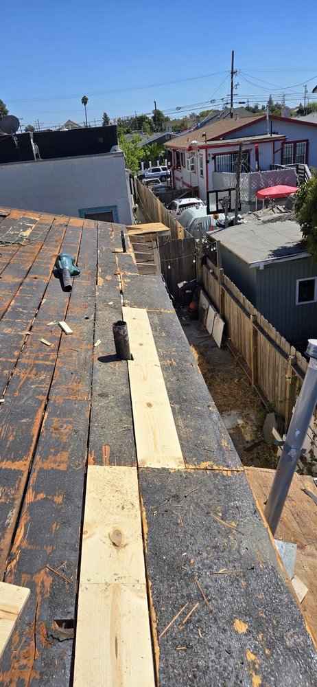 Slide of Astro Roofing