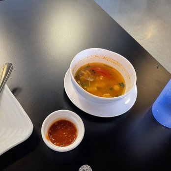 Surin Thai - Tom Yum Soup. I already finish 3/4. Highly recommended if you like spicy - Thai Near Me - Banning, California