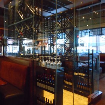 CRAVE - Wine display in the dining room. - New American Near Me - Woodbury, Minnesota