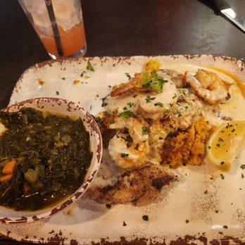 Mambo’s - Blackened Red Fish topped with shrimp and Mustard greens on the side. - Cajun/Creole Near Me - New Orleans, Louisiana Mambo’s - Blackened Red Fish topped with shrimp and Mustard greens on the side. - Cajun/Creole Near Me - New Orleans, Louisiana