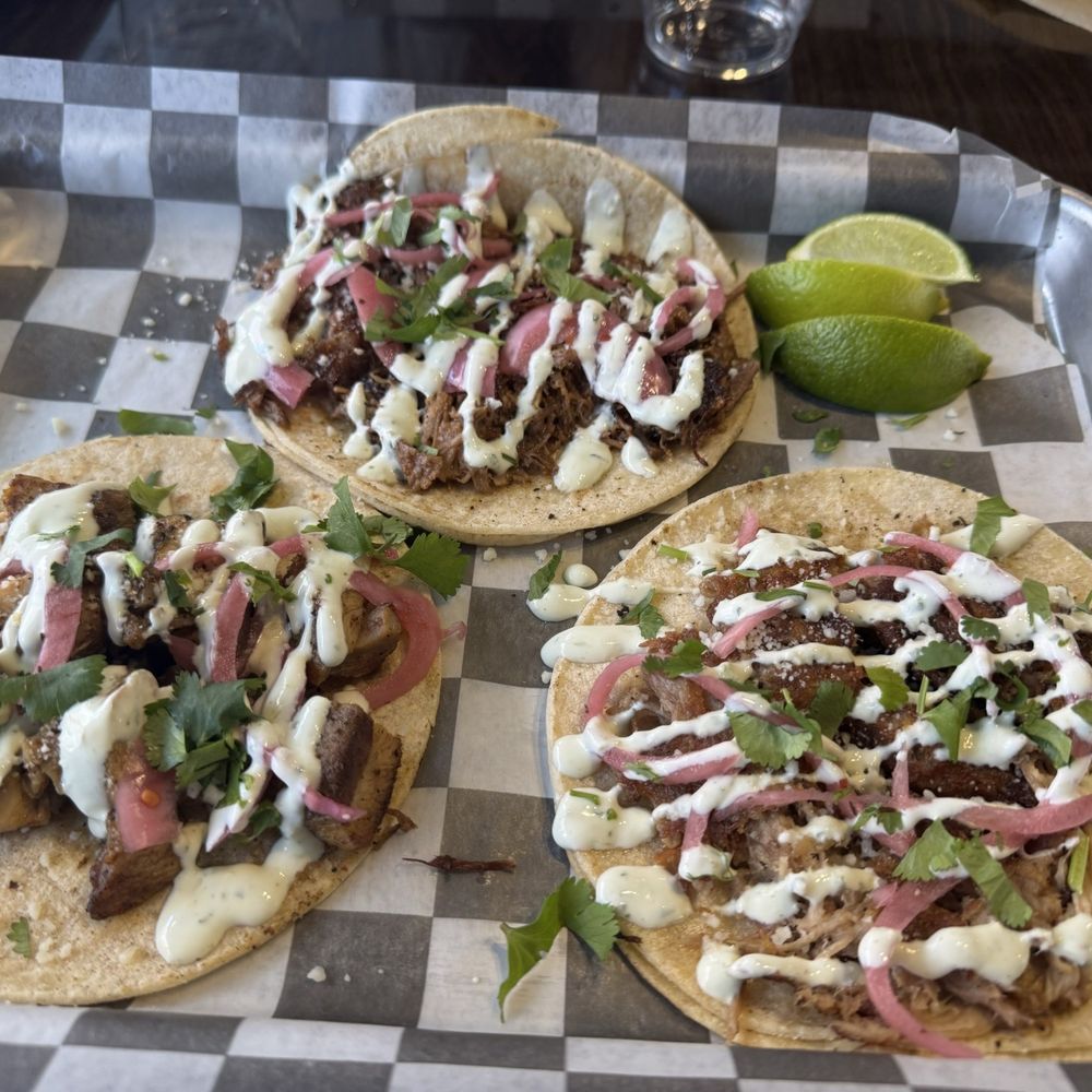 Left to right: Chicken lime taco, brisket taco, pork taco. Left to right: Chicken lime taco, brisket taco, pork taco.