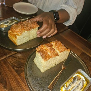 Boro Brine - Focaccia- Stracciatella, anchovies, and tomato-garlic confit. $9. Delicious - Seafood Near Me - Brooklyn, New York
