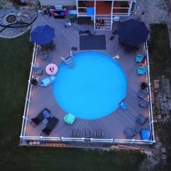 Pla-Mor Pools - Radiant Aluminum insulated pool kit - semi-inground with full deck.