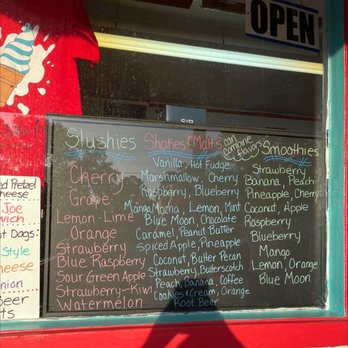 Deluxe Tastee Cream - a menu on a window - Hot Dogs Near Me - La Porte, Indiana