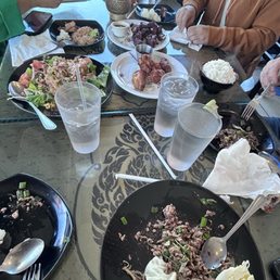 Variety of foods we ordered and more on the way. They were delivered to the table as they were ready. Not all at once.