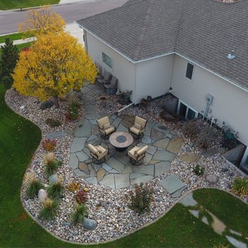 Oasis Landscapes - an aerial view of a patio area - Landscaping Near Me - West Fargo, North Dakota Oasis Landscapes - an aerial view of a patio area - Landscaping Near Me - West Fargo, North Dakota