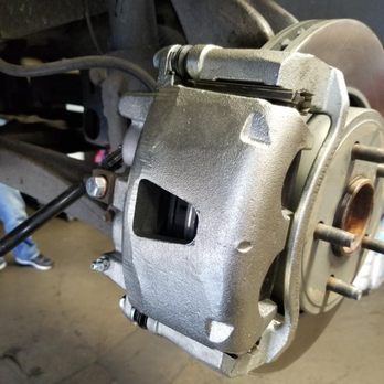 Jiffy Lube - Calipers placed on wrong or upside down by jiffy lube. Watched 5 of the employees check the car and not one of them realized the mistake. - Auto Repair Near Me - Westminster, California