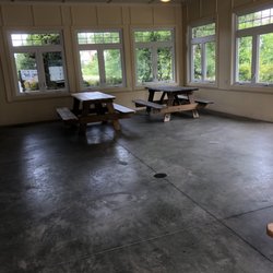 Stonebridge Creek Rec Center - Simple indoor area with picnic tables.