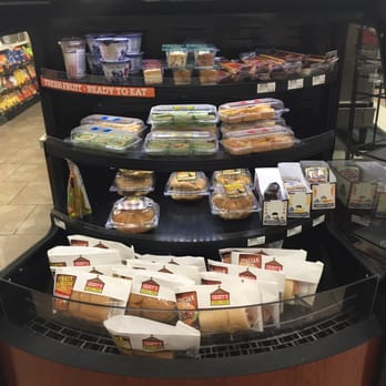 Casey's - a display of food items in a grocery store - Pizza Near Me - Fairfield, Iowa