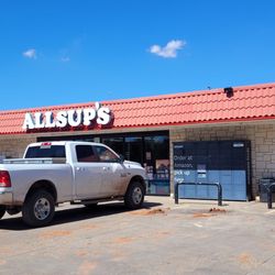 Allsup's Convenience Store - Store front with Amazon box