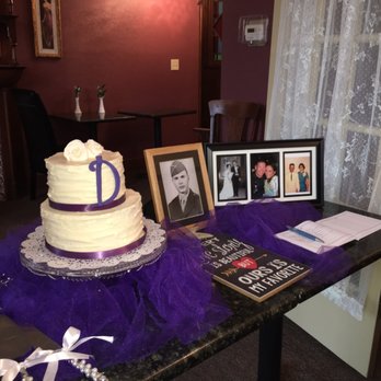 Sweet Creations - a table with a cake and pictures - Bakeries Near Me - Herington, Kansas Sweet Creations - a table with a cake and pictures - Bakeries Near Me - Herington, Kansas