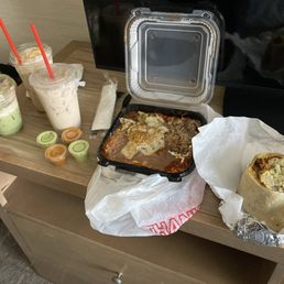 Chilaquiles plate, Wake Yo Butt Up Burrito (B-Fast), Caramel Horchata Chai, Mazapán Matcha, Horchata Chilaquiles plate, Wake Yo Butt Up Burrito (B-Fast), Caramel Horchata Chai, Mazapán Matcha, Horchata