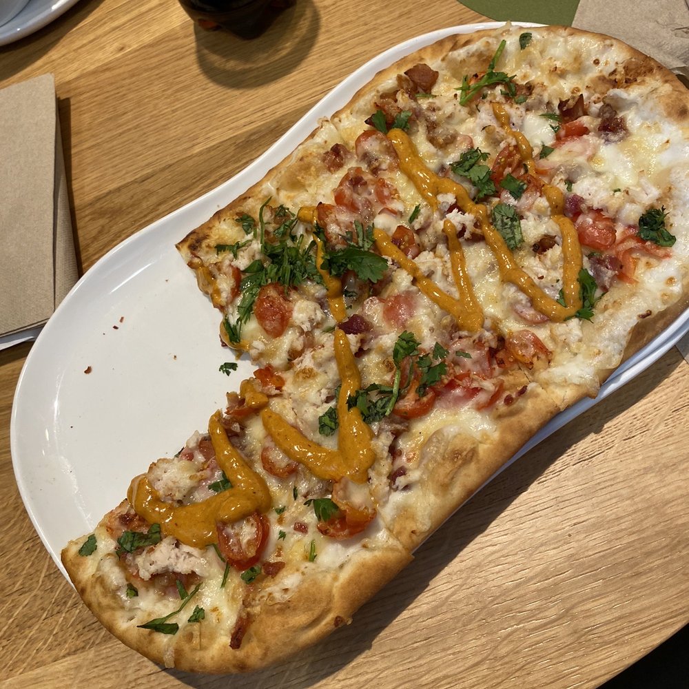 Chicken bacon chipotle flatbread pizza. Chicken bacon chipotle flatbread pizza.