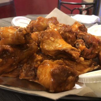 Ice House Grill - 20 wings in garlic Buffalo sauce - Sandwiches Near Me - Titusville, Florida