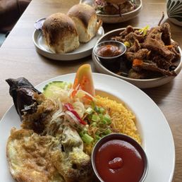 Pan de sal with vegan ube butter, fried oysters, vegan fried chicken sandwich, tortang talong rice plate Pan de sal with vegan ube butter, fried oysters, vegan fried chicken sandwich, tortang talong rice plate