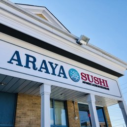 the front of the building - Araya Sushi's storefront sign displays the restaurant's name and indicates it offers Japanese and Korean cuisine.