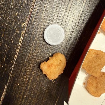 Jack in the Box - Chicken nugget next to standard water bottle cap - Burgers Near Me - Santa Clarita, California Jack in the Box - Chicken nugget next to standard water bottle cap - Burgers Near Me - Santa Clarita, California